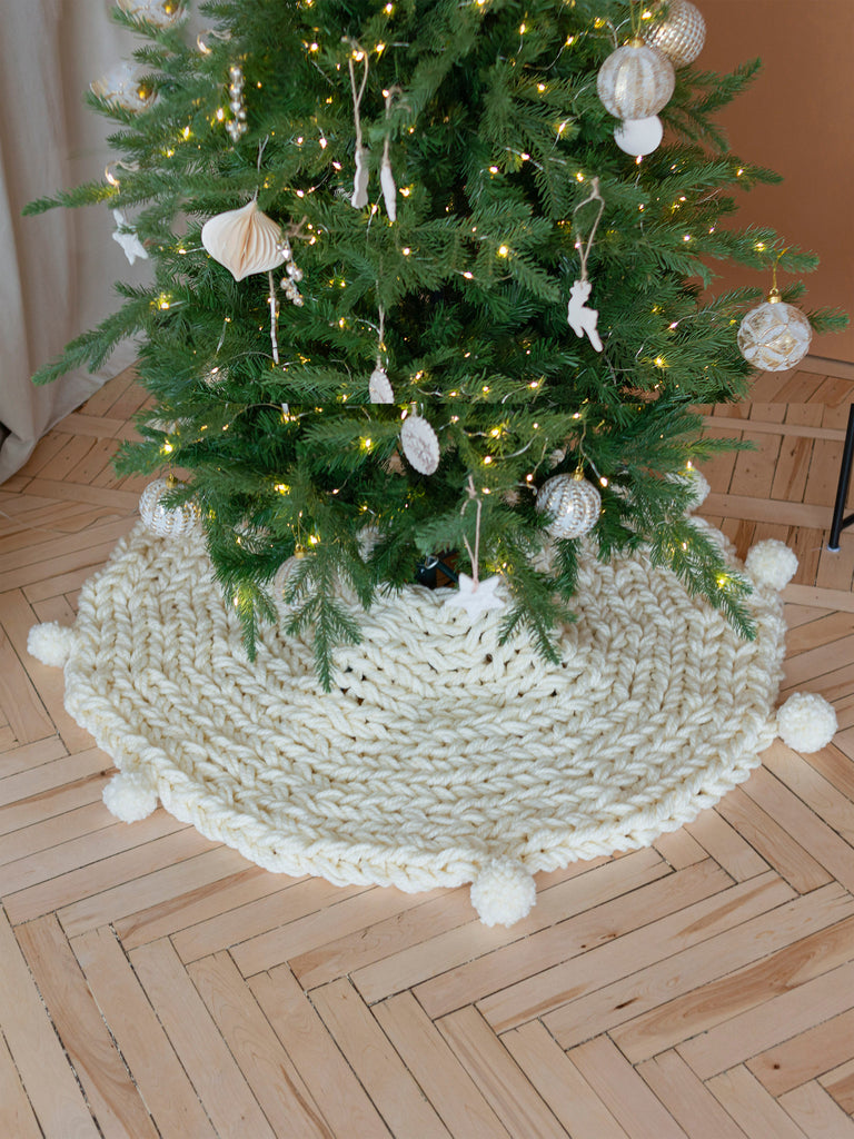 Creamy knit Christmas tree skirt with pompoms